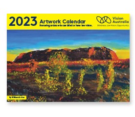 2023 Vision Australia calendar featuring artwork of Uluru on the cover