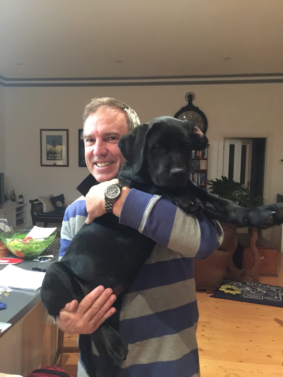 Reggie with his Volunteer Puppy Carer Peter 