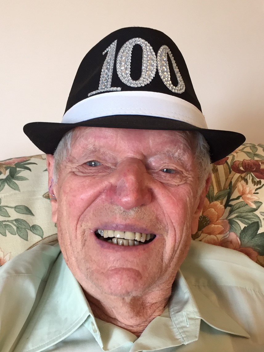 Dennis wearing his 100 years hat
