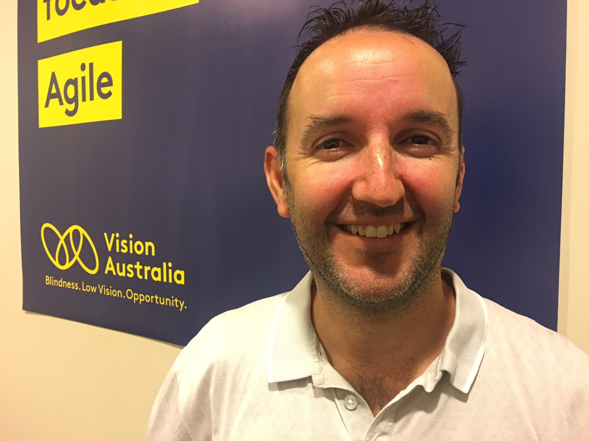 Luke Price at Vision Australia office