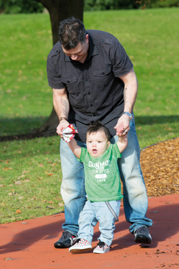 Domenic learing to walk with his dad