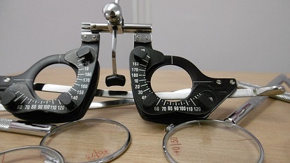 Image shows lenses and equipment used to test a person's vision