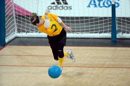 An female Australian goalball player in action