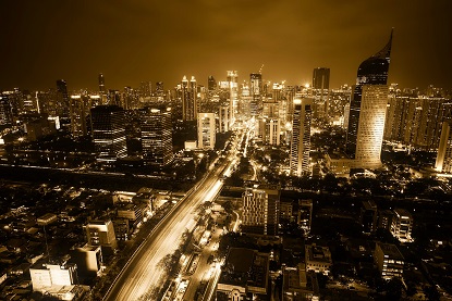 Image shows an aerial view of Jakart at night