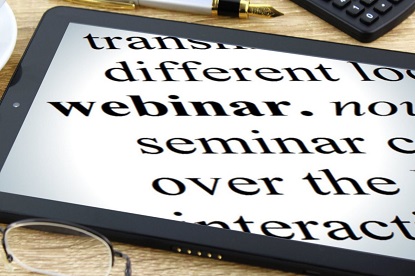 Image shows the word webinar on a tablet device