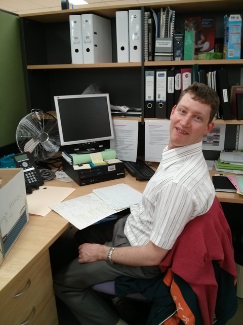 Volunteer Paul McIntosh at his desk