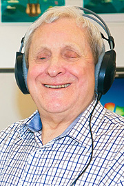 Frank Nowlan smiling with headphones on head