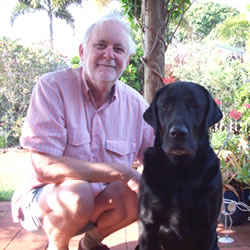 Photo of Geoff Skinner with his guide dog