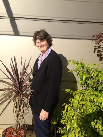 image of Helen standing in the sensory garden at the Gosford centre