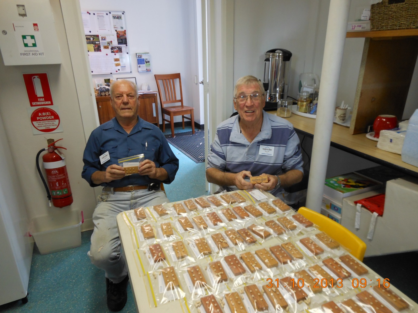 Norm Shopland and Harold Pedley from Harry's Shed with the braille boards