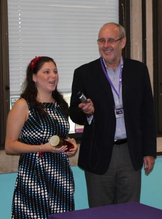 Nastasia thanks Vision Australia for the Youth Service Award. She is pictured with Vision Australia CEO Ron Hooton