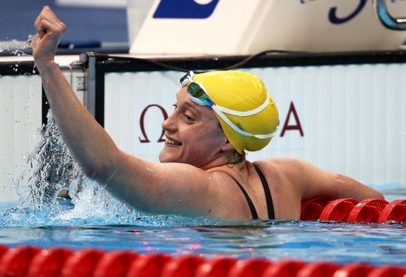 Prue Watt smiling at the finish end of the pool after her win