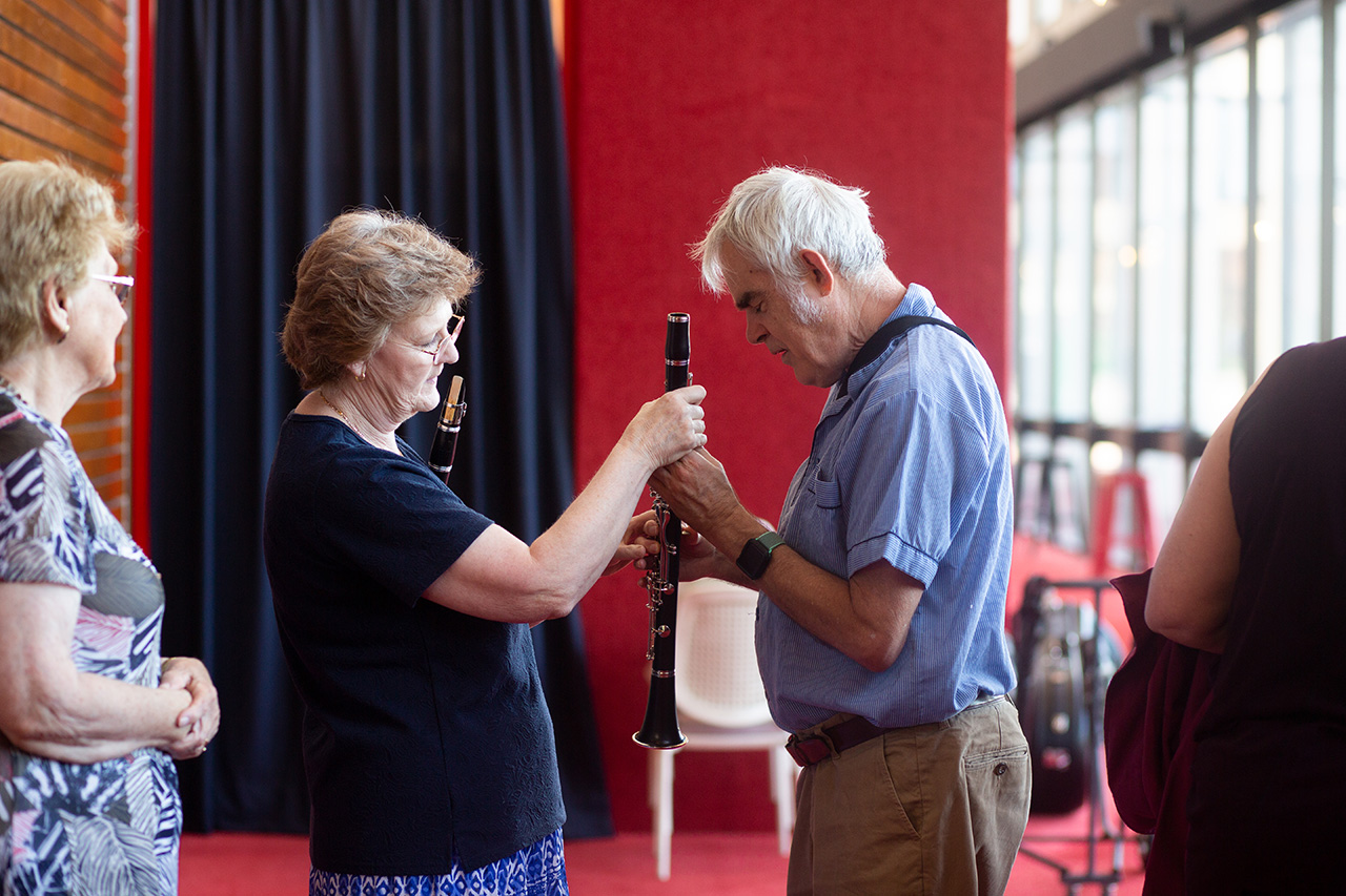 Vision Australia client Peter with a WASO musician learning about the clarinet. Photos by Alanna Kusin, WASO.