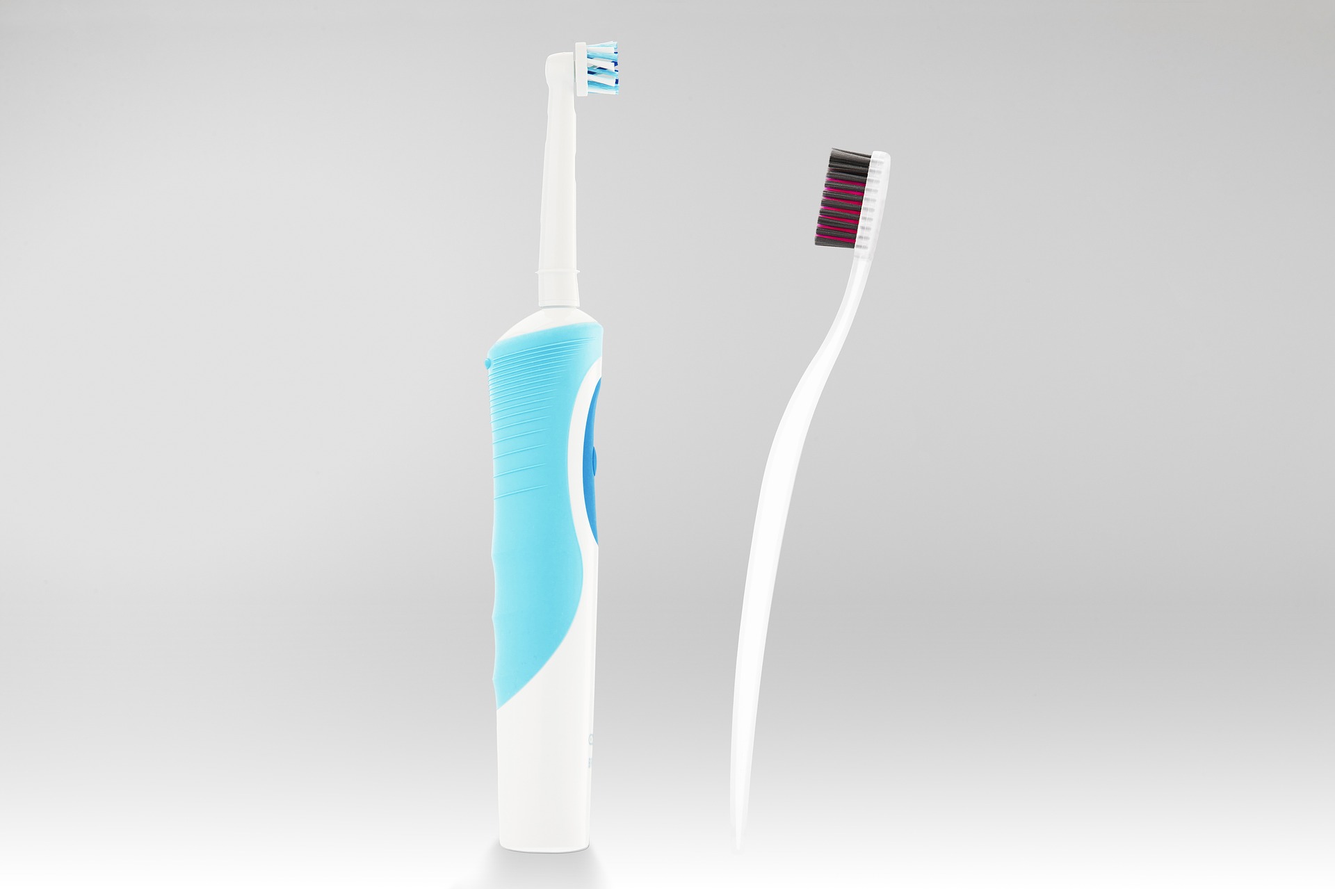An electric and a manual toothbrush